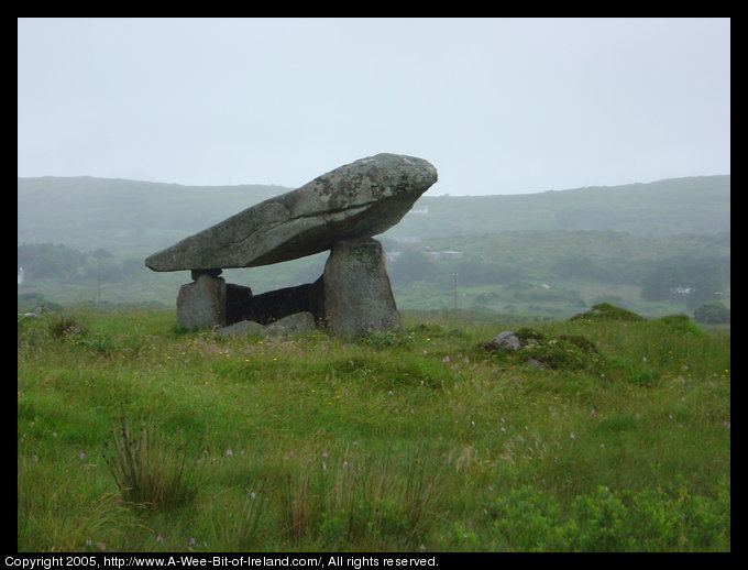 Kilclooney More Dolmen in County Donegal. A rock the size of a small automobile has been placed on top of standing stones about 6000 years ago.