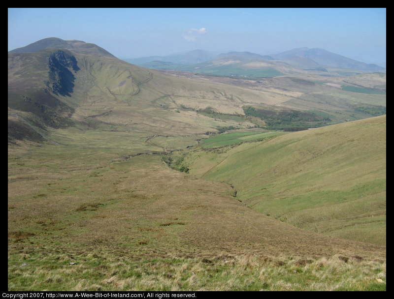 Mountain covered with grass and brown blanket bog