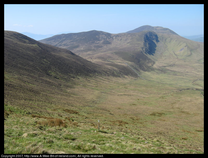 Mountain covered with grass and brown blanket bog