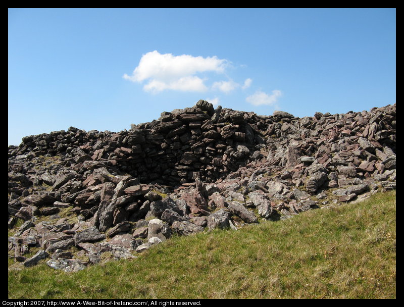 Mountain covered with grass and brown blanket bog