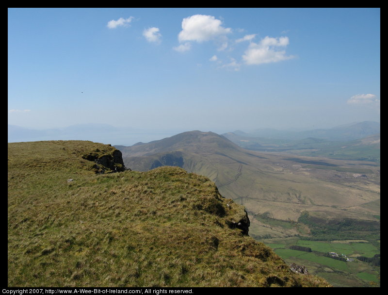 Mountain covered with grass and brown blanket bog