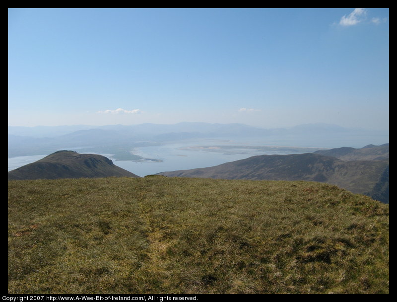 Mountain covered with grass and brown blanket bog