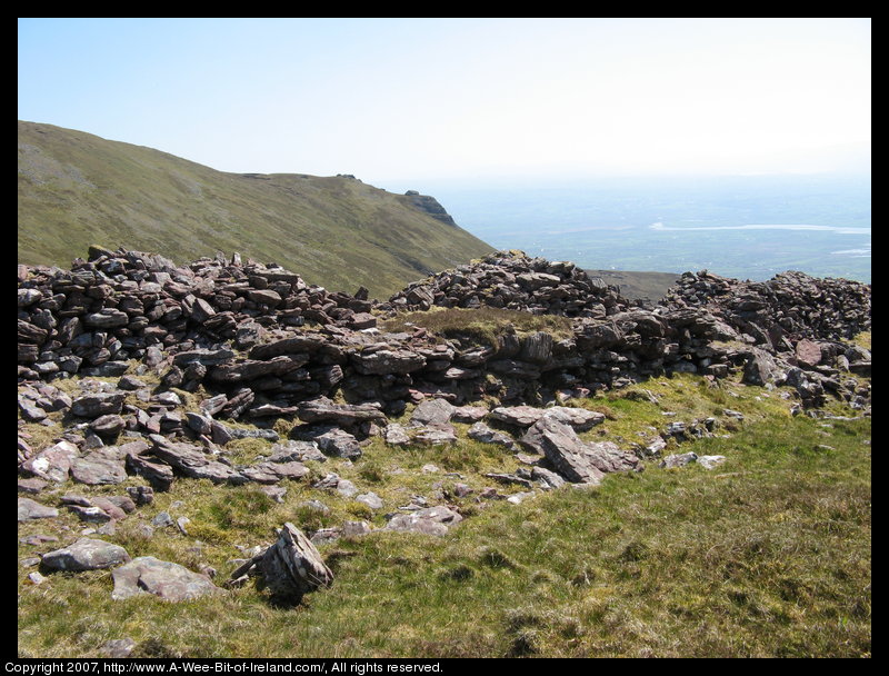 Mountain covered with grass and brown blanket bog