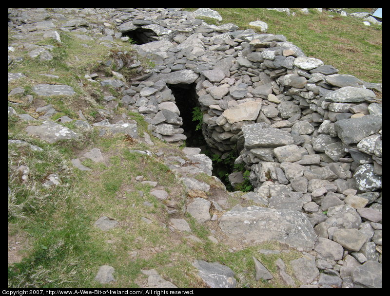 An ancient stone building built without mortar. The roof is missing in places.