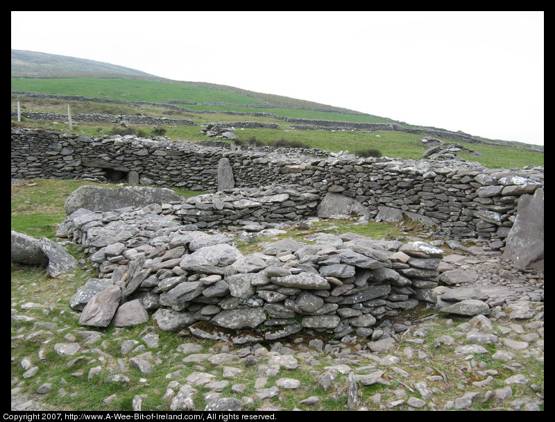 Stone walls and ancient ruins of buildings.