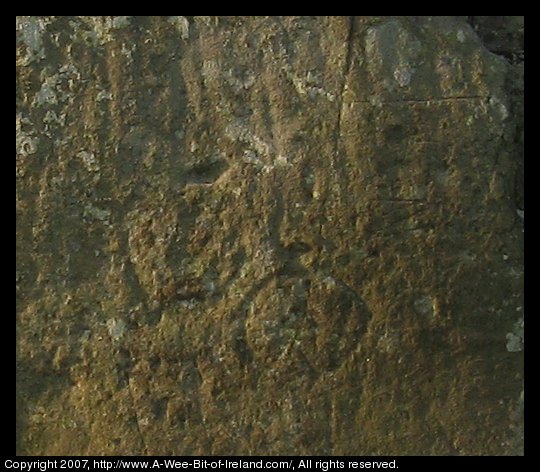 standing stone with two circles inscribed on its face