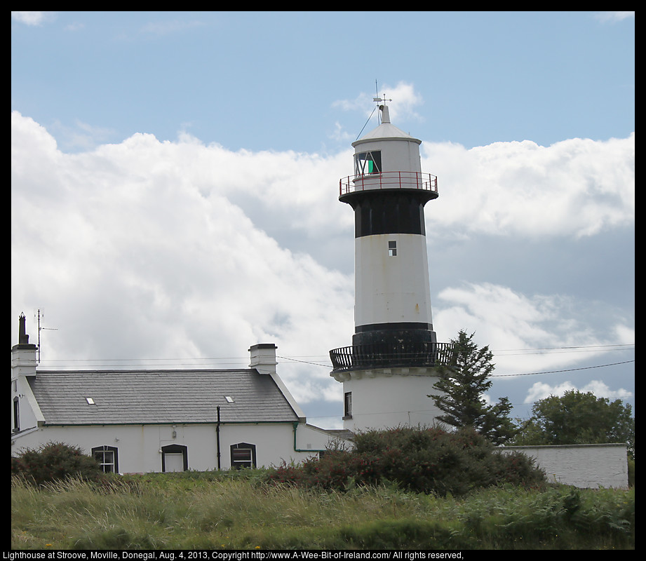 A lighthouse on a rocky coast.