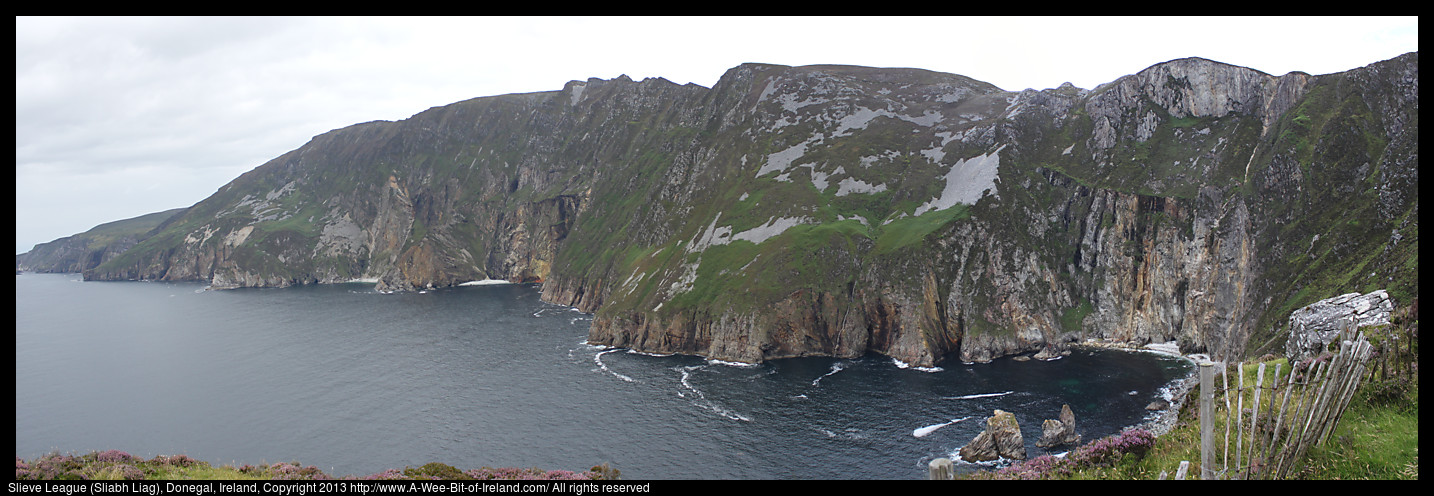 Cliffs rising from the Atlantic Ocean.