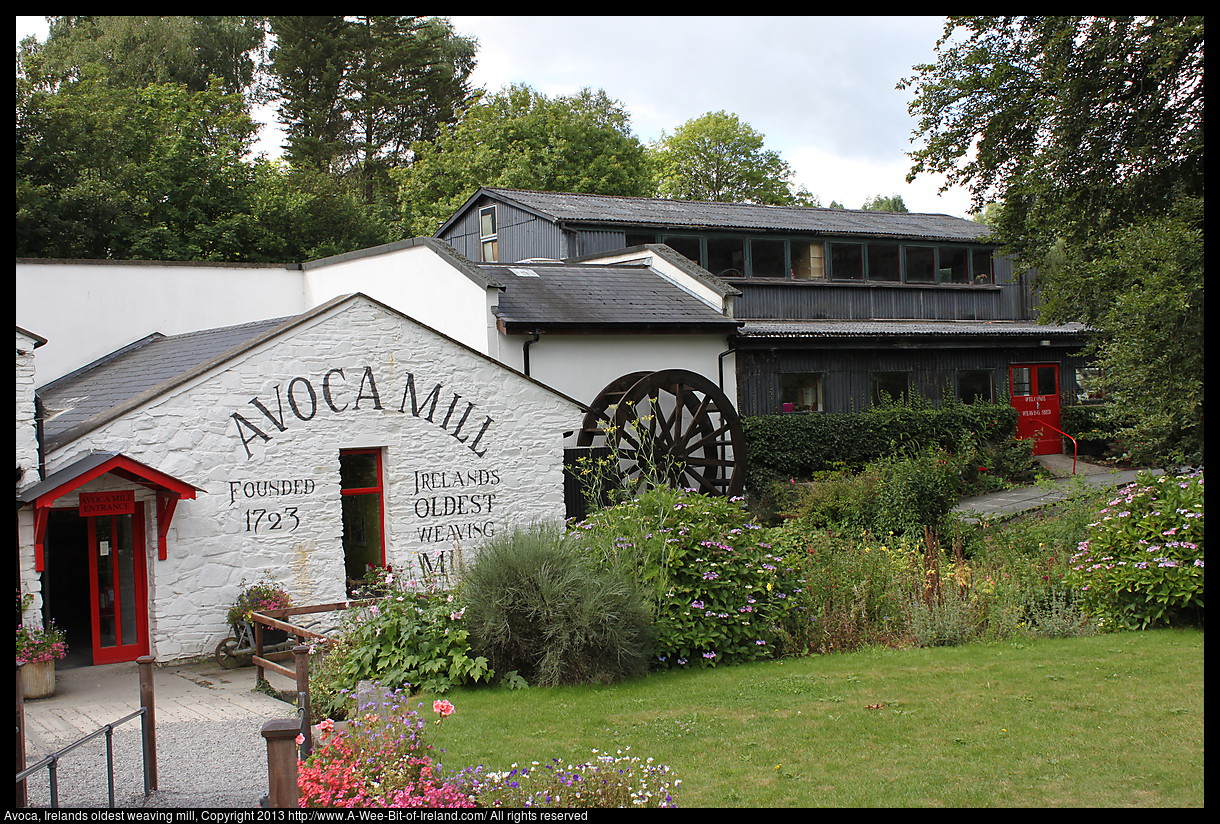 A white building with Avoca Mill Founded 1723 written on the front.