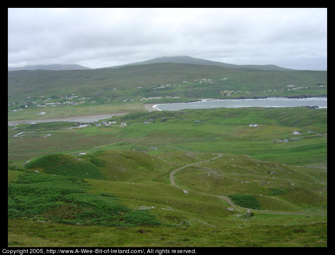 The view from Beefan and Garveross Mountain. Houses in the valley
 and the Blue Stack Mountains at the horizon.