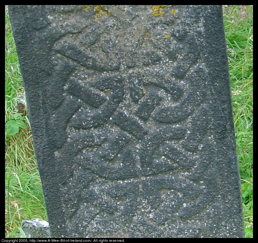 Cross slab on Inishkeel Island near Naran, Donegal, with Celtic knot.