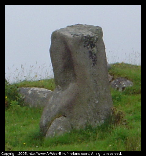 Square looking rock sticking into the sky.