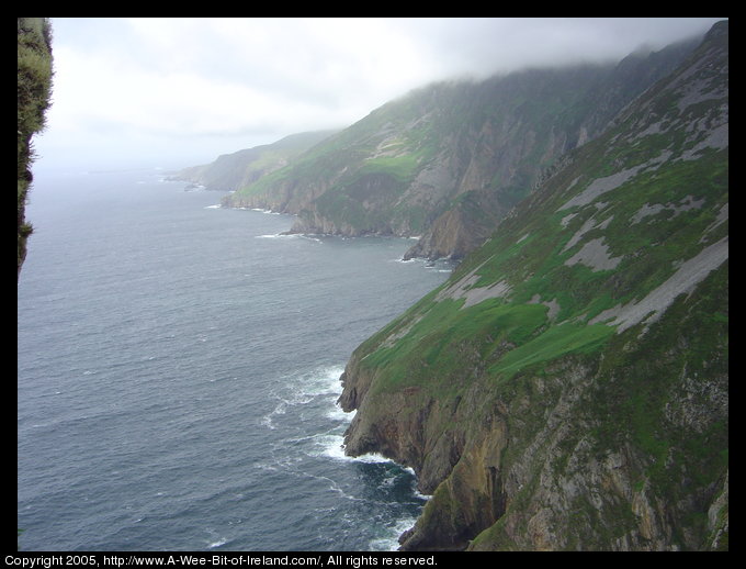 Near the Slieve League sea cliffs, standing the edge and looking at the cliffs. The cliffs fall to the Atlantic Ocean.