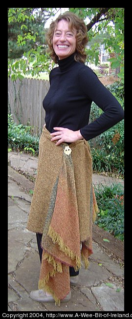 model wearing ruana as a skirt